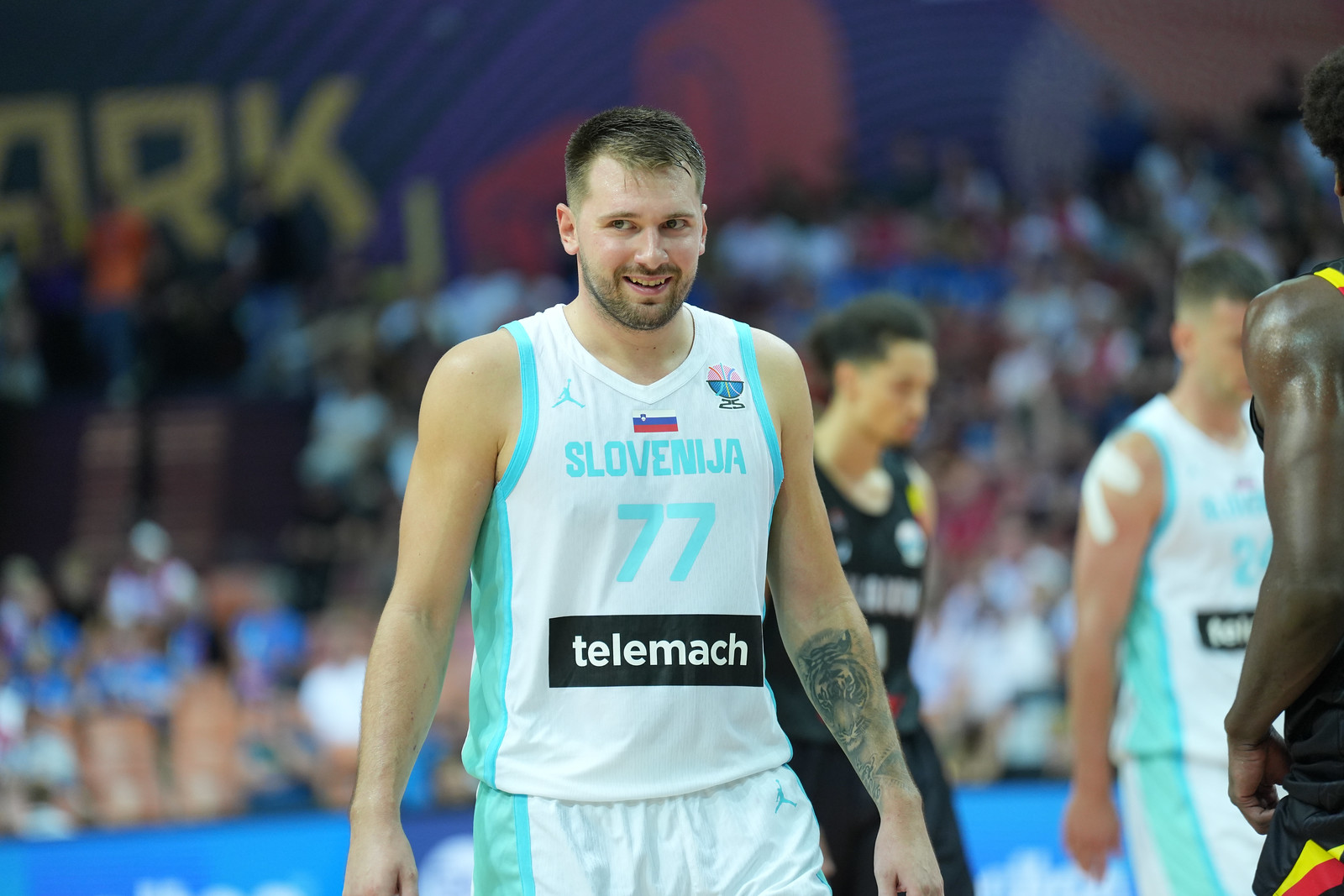 Luka Doncic recorded a triple-double and Slovenia beat Belgium